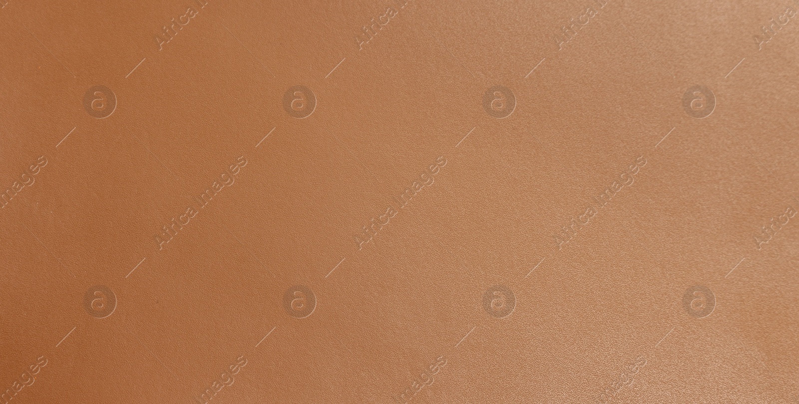 Photo of Brown natural leather as background, top view