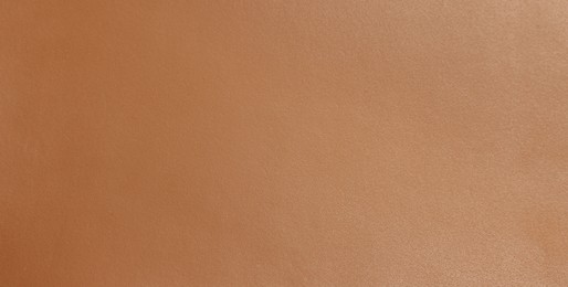 Photo of Brown natural leather as background, top view