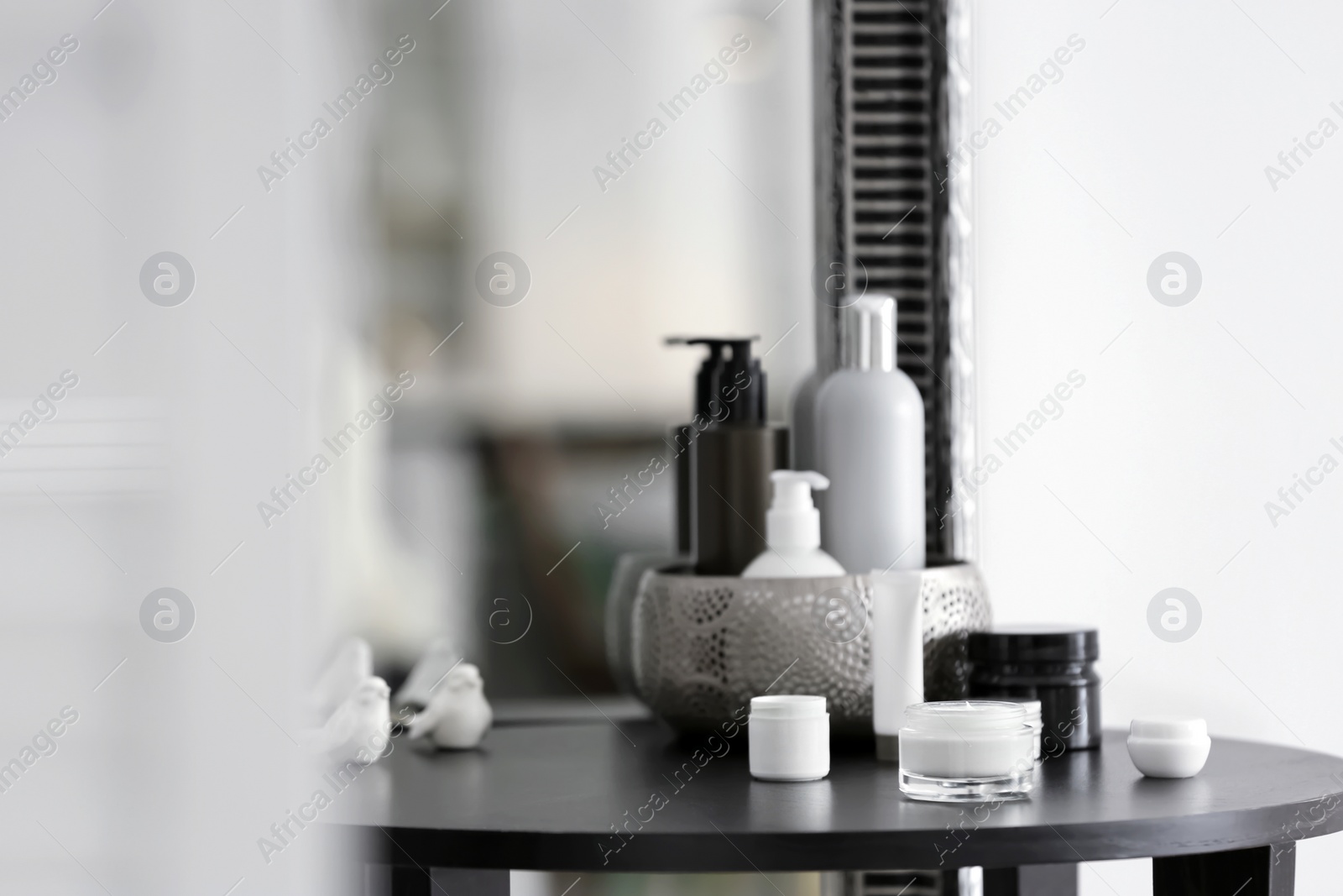 Photo of Set of body care cosmetics on table