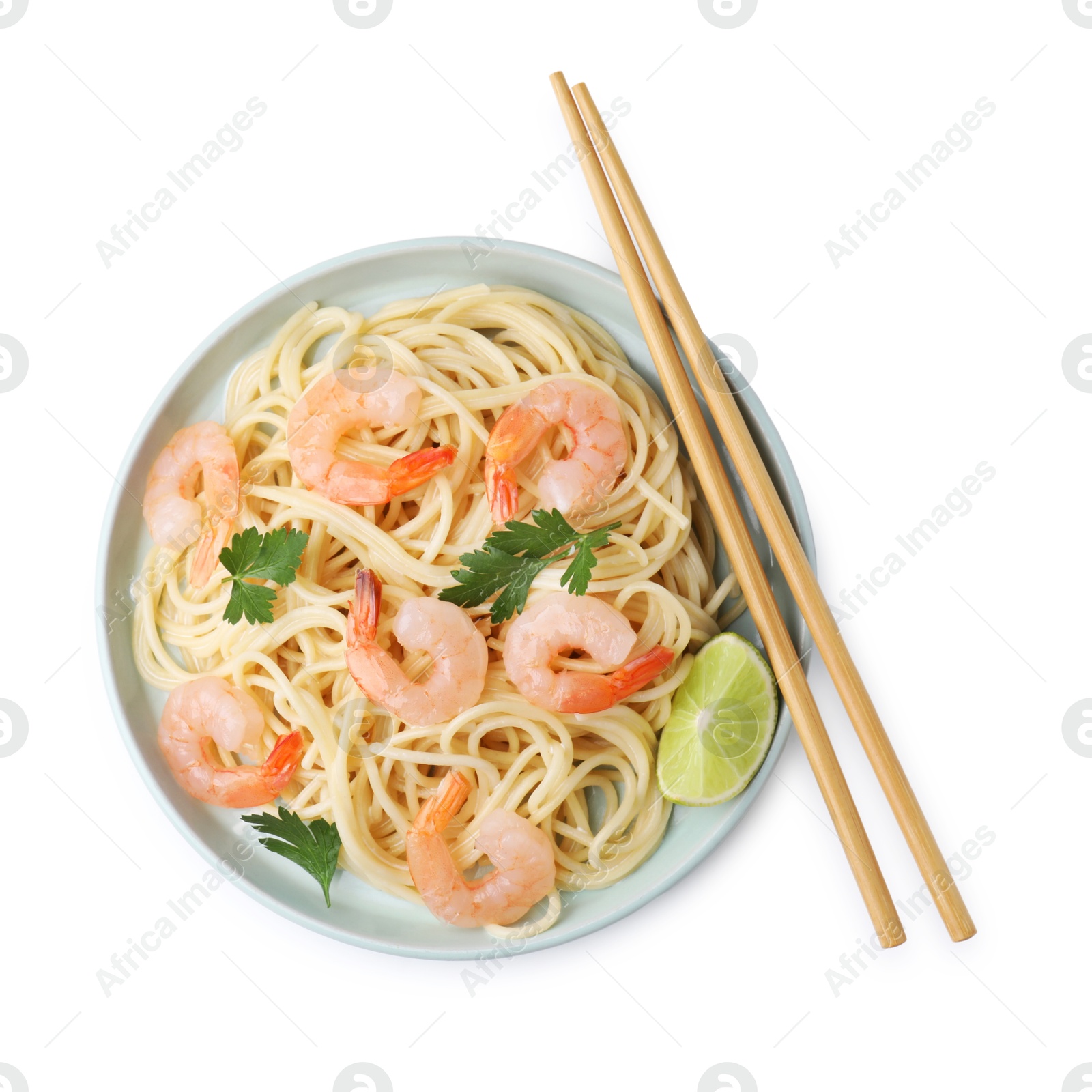 Photo of Tasty spaghetti with shrimps, lime and parsley isolated on white, top view