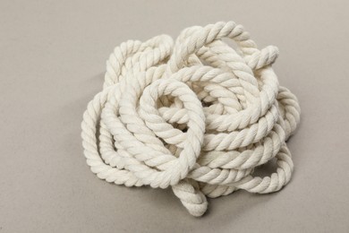 Photo of Bundle of hemp rope on light grey background