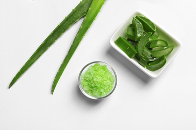 Flat lay composition with aloe vera on white background