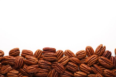 Delicious fresh pecan nuts on white background, flat lay. Space for text