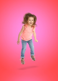 Happy cute girl jumping on color gradient background