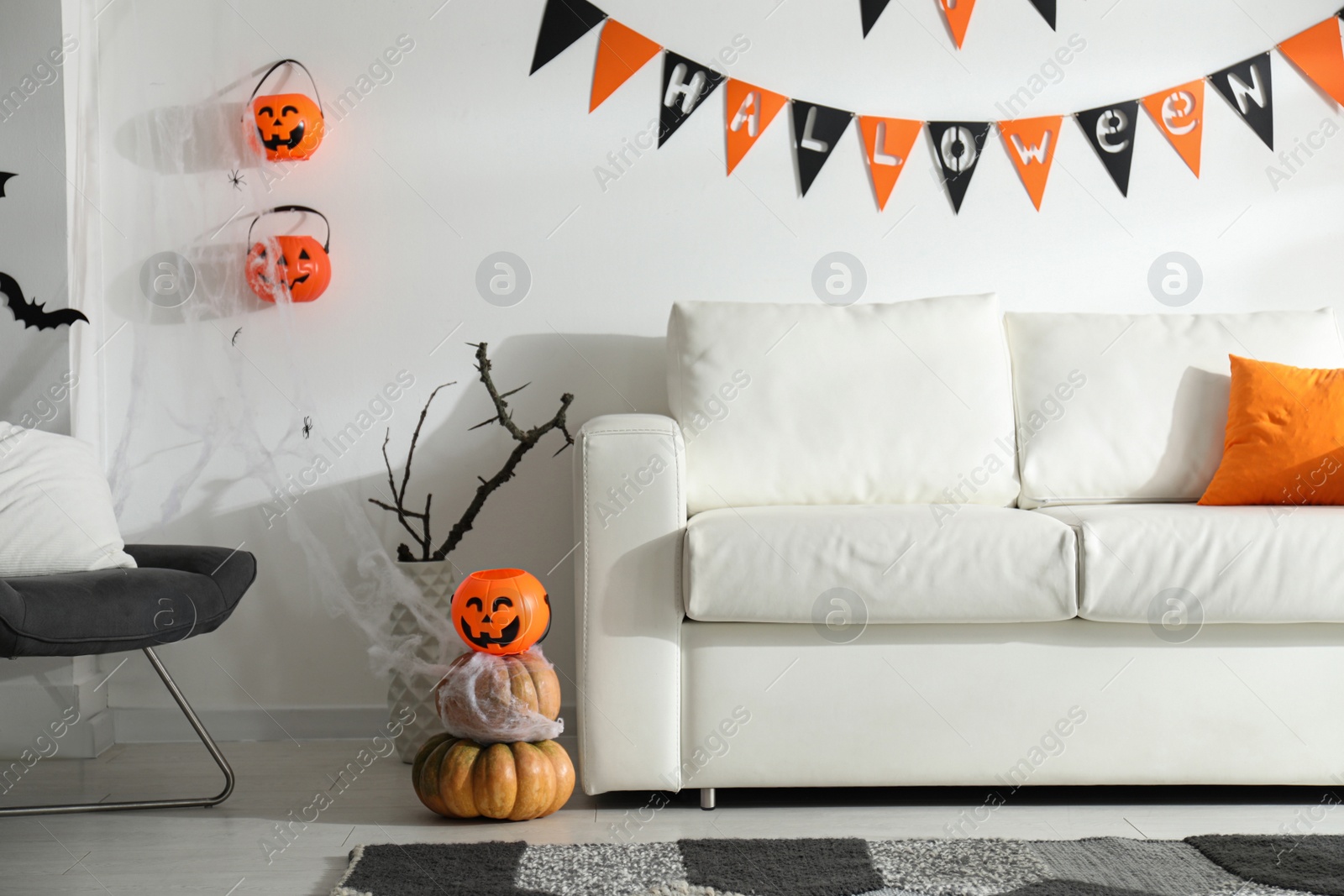 Photo of Modern room decorated for Halloween. Festive interior