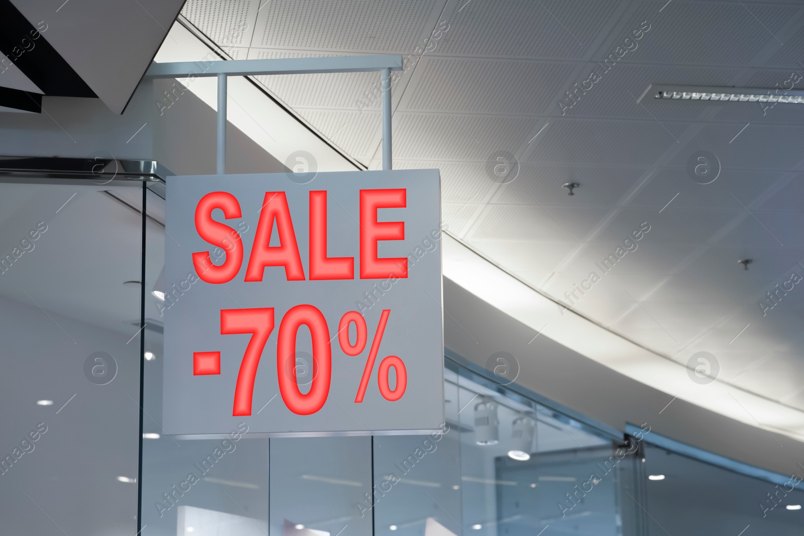 Image of Sale sign near entrance in fashion store