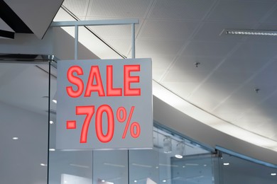 Image of Sale sign near entrance in fashion store