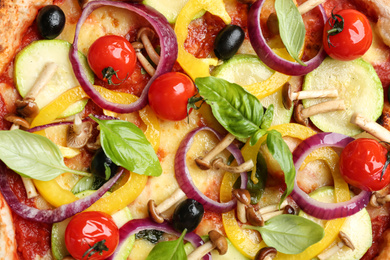 Delicious hot vegetable pizza with mushrooms as background, closeup