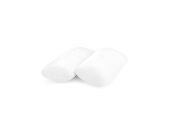 Photo of Two pieces of chewing gum on white background