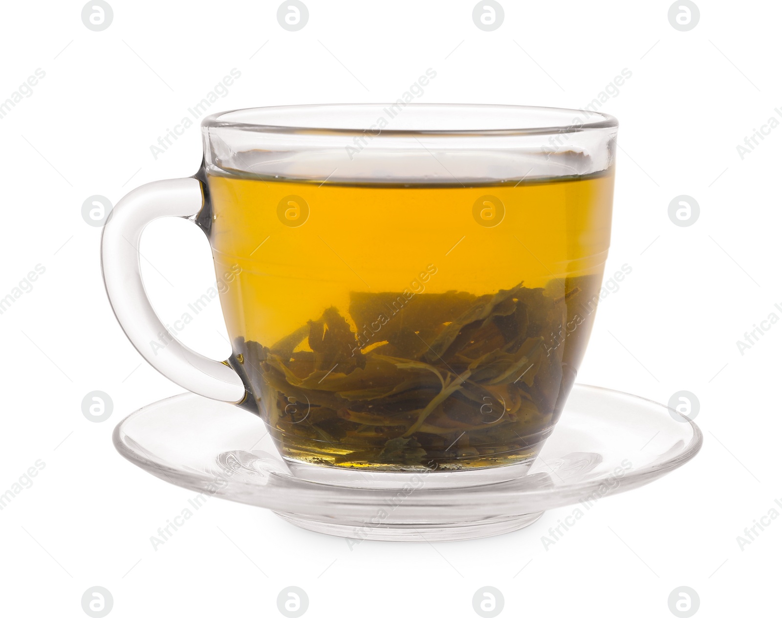 Photo of Fresh green tea in glass cup, leaves and saucer isolated on white