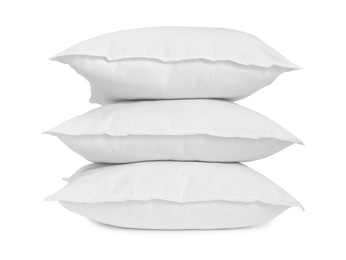 Three new soft pillows isolated on white