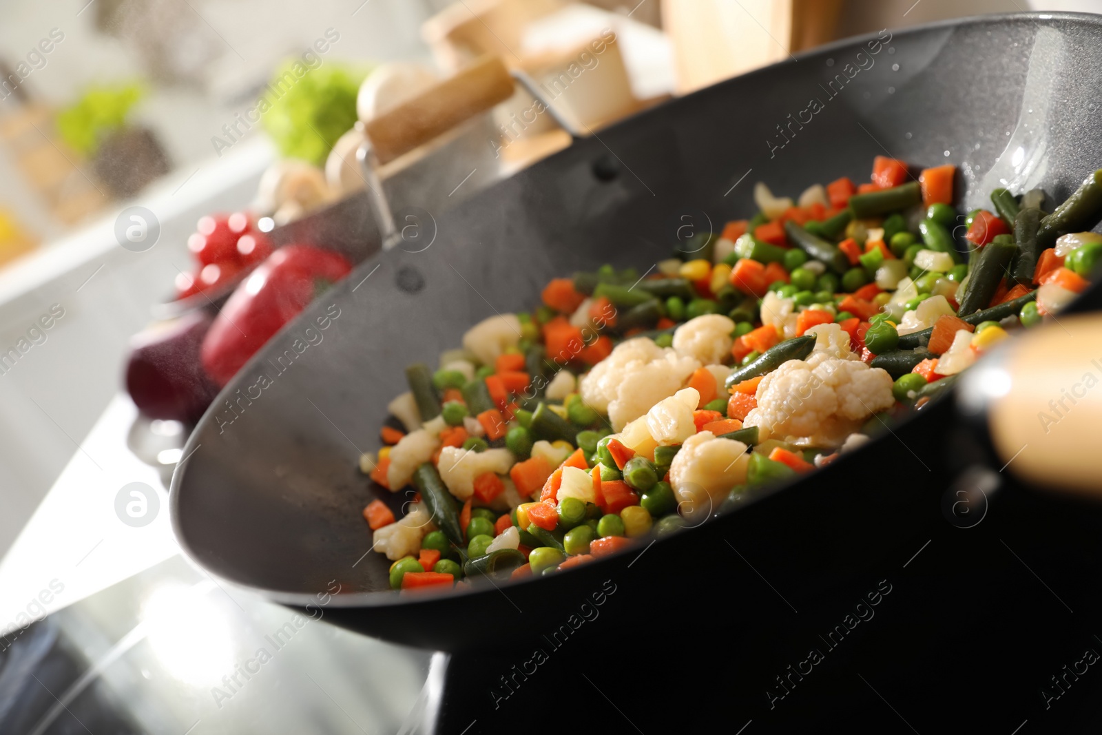 Photo of Frying pan with mix of fresh vegetables, closeup