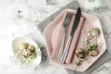 Festive Easter table setting with beautiful floral decor, flat lay