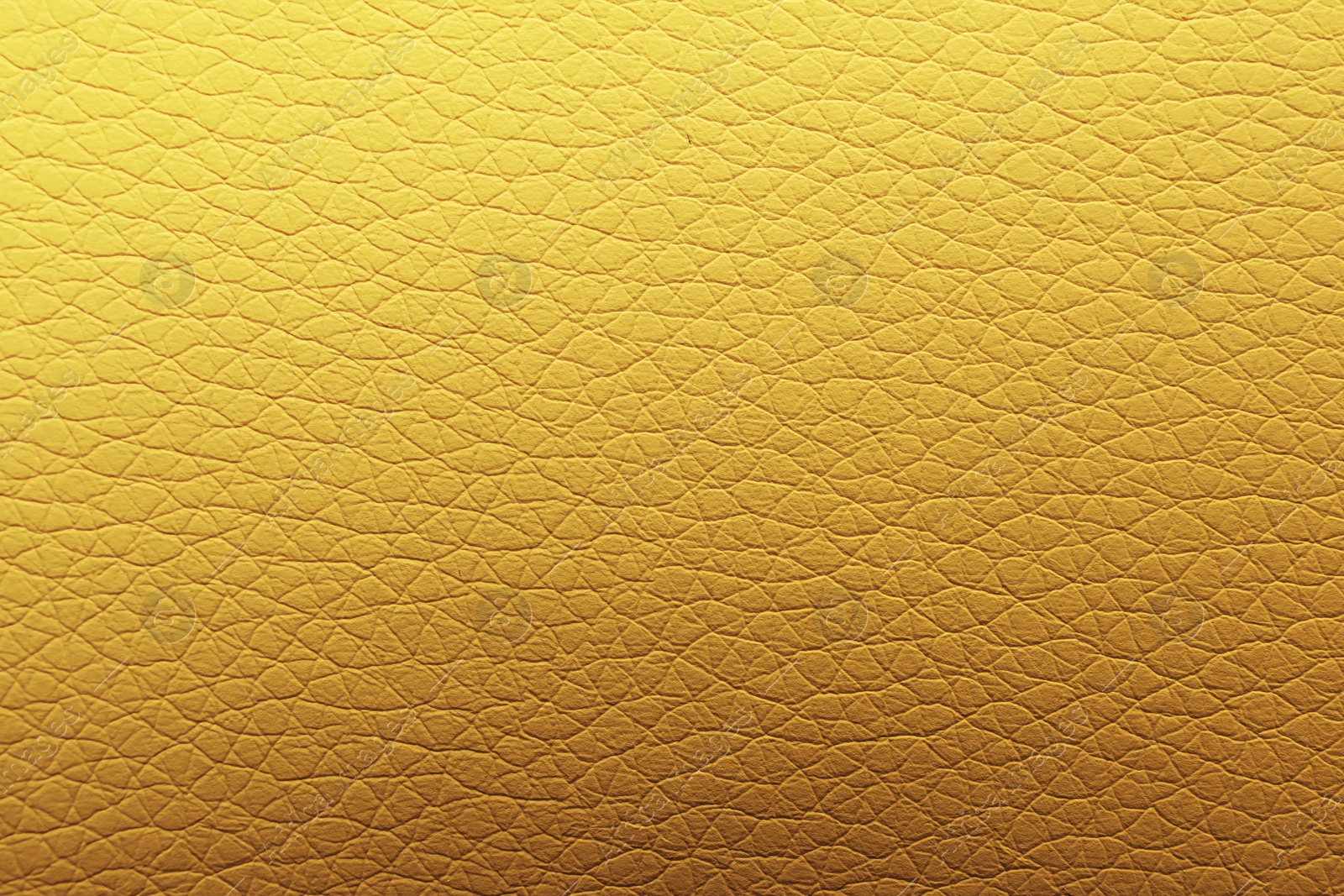 Image of Golden textured surface as background, closeup view