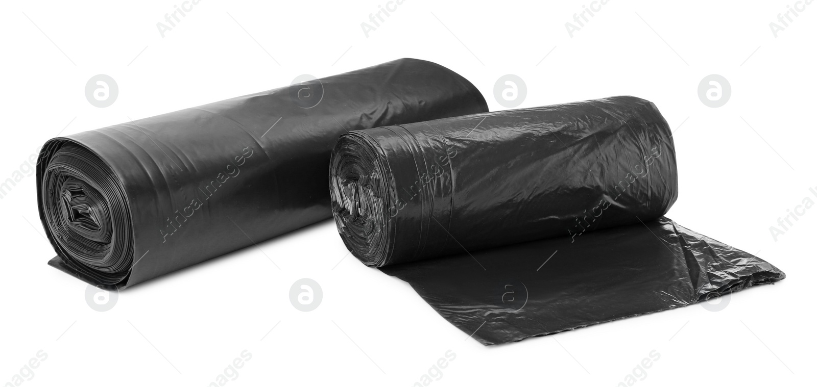 Photo of Rolls of black garbage bags isolated on white