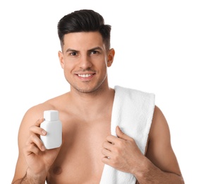 Photo of Handsome man with stubble holding post shave lotion on white background