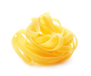 Photo of Uncooked fettuccine pasta on white background