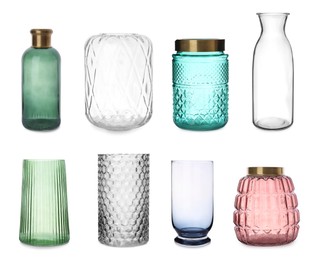 Image of Set of different stylish glass vases on white background