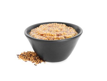 Photo of Fresh whole grain mustard in bowl and dry seeds isolated on white