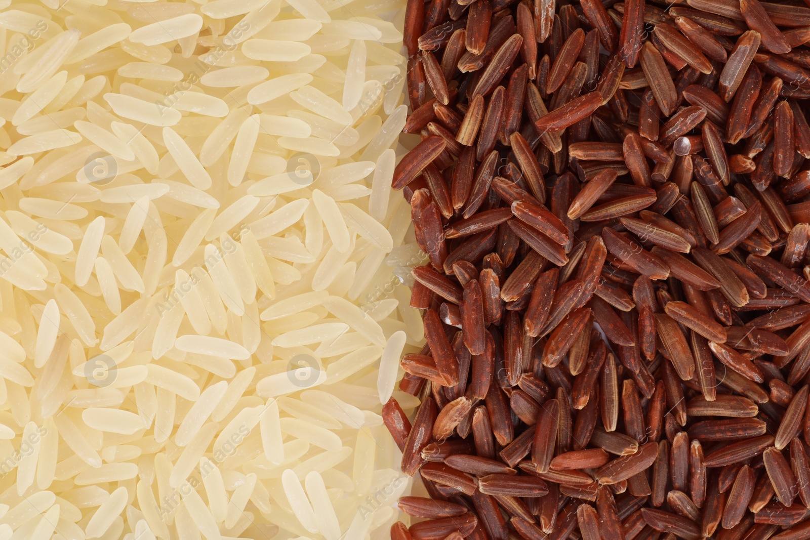 Photo of Raw white and red rice as background, top view