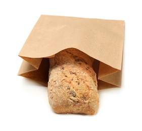 Photo of Paper bag with bread on white background. Space for design