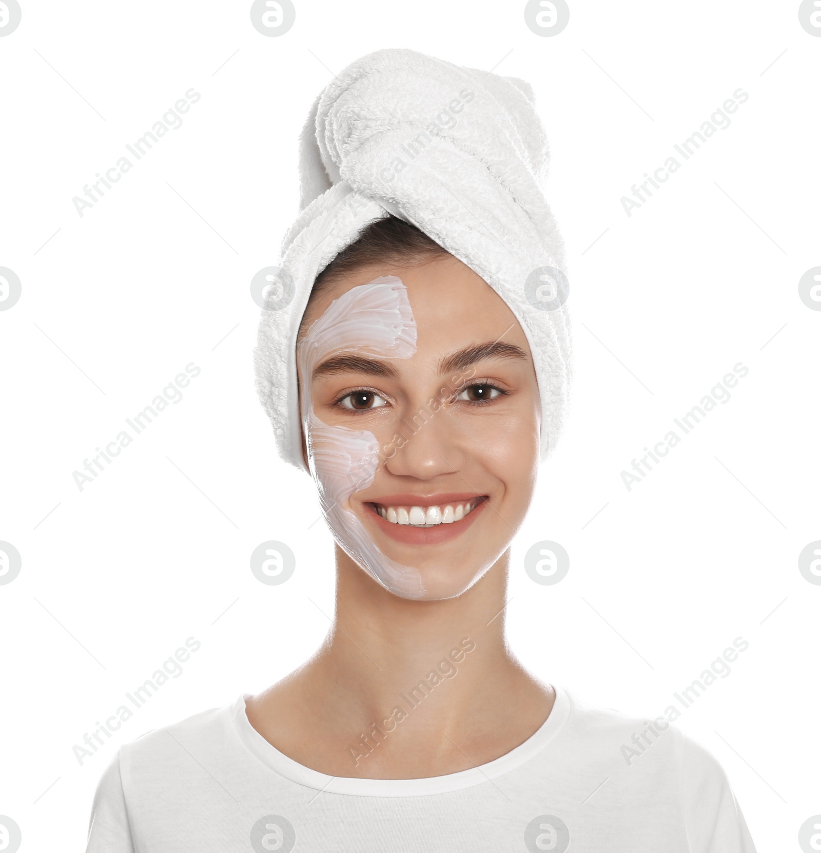 Photo of Happy young woman with organic mask on her face against white background