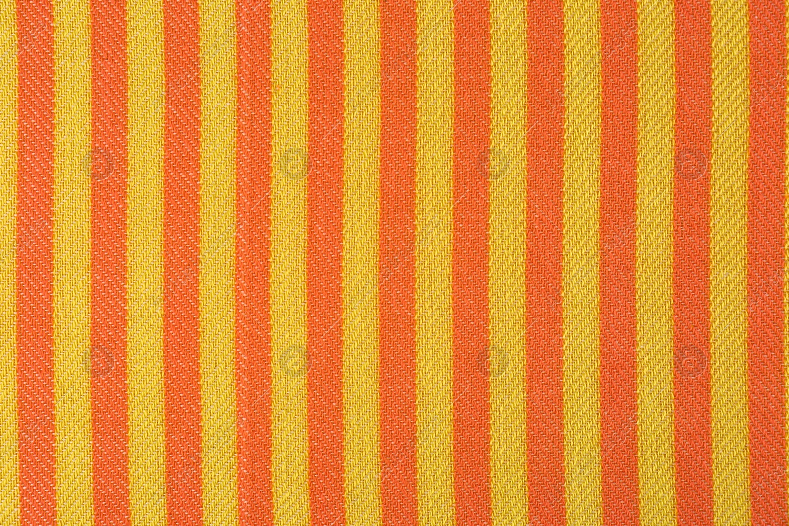 Photo of Striped beach towel as background, top view