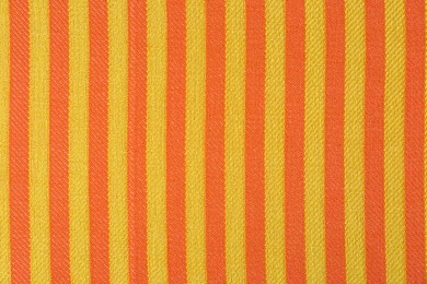 Photo of Striped beach towel as background, top view