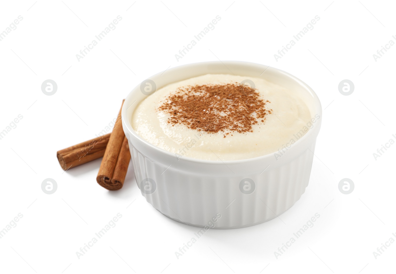 Photo of Delicious semolina pudding with cinnamon on white background