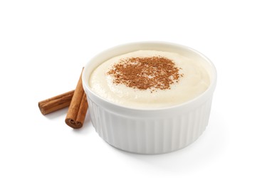 Photo of Delicious semolina pudding with cinnamon on white background