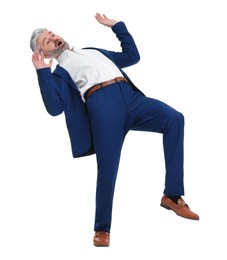 Photo of Mature businessman in stylish clothes avoiding something on white background