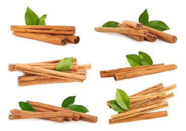 Set with aromatic cinnamon sticks on white background 