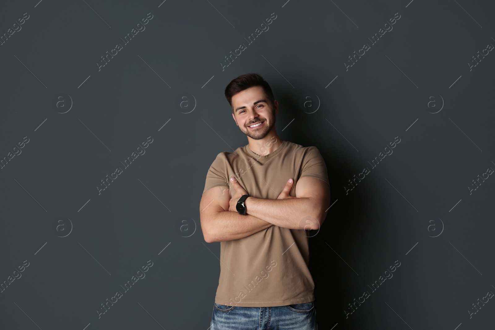 Photo of Portrait of handsome man on dark background