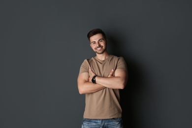 Photo of Portrait of handsome man on dark background