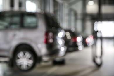 Blurred view of modern automobile repair shop