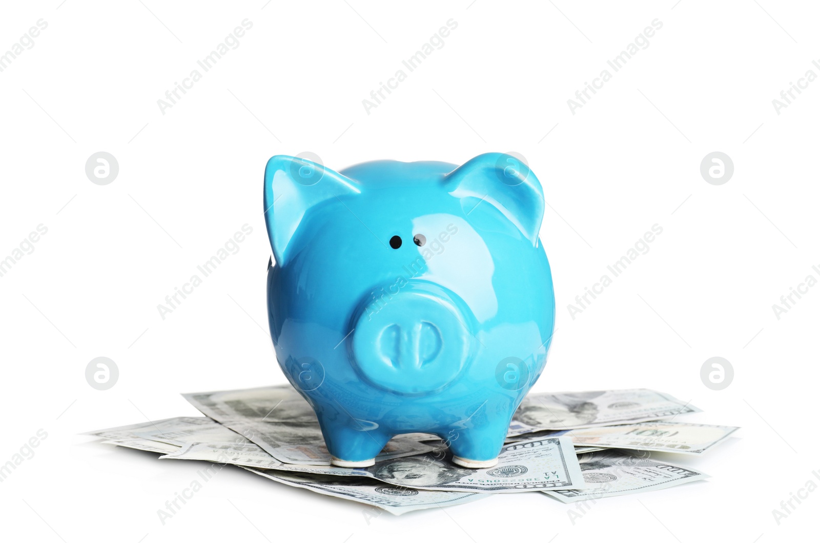 Photo of Piggy bank with money on white background