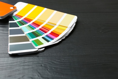 Photo of Color palette samples on black background