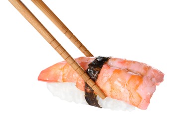 Photo of Chopsticks with delicious nigiri sushi isolated on white