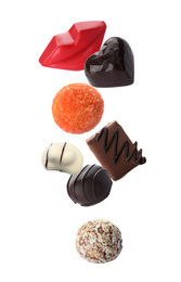 Image of Different chocolate candies falling on white background