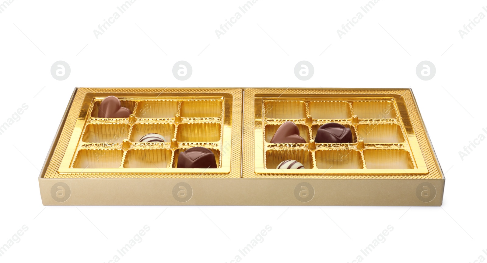 Photo of Partially empty box of chocolate candies isolated on white