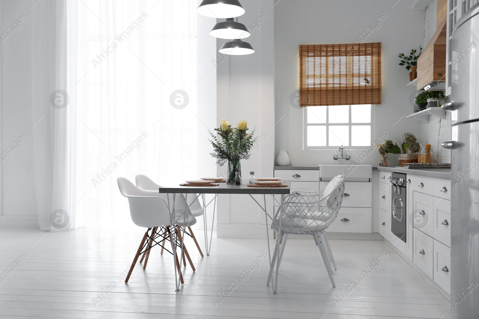 Photo of Beautiful kitchen interior with new stylish furniture