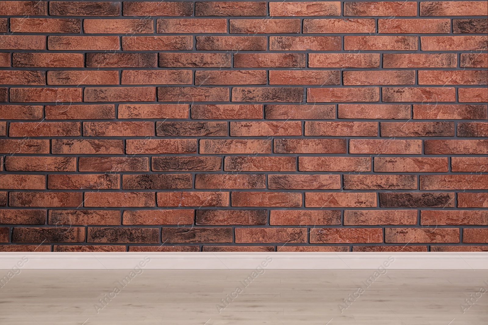 Image of Room with brick wall and wooden floor