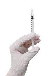 Doctor holding medical syringe on white background, closeup