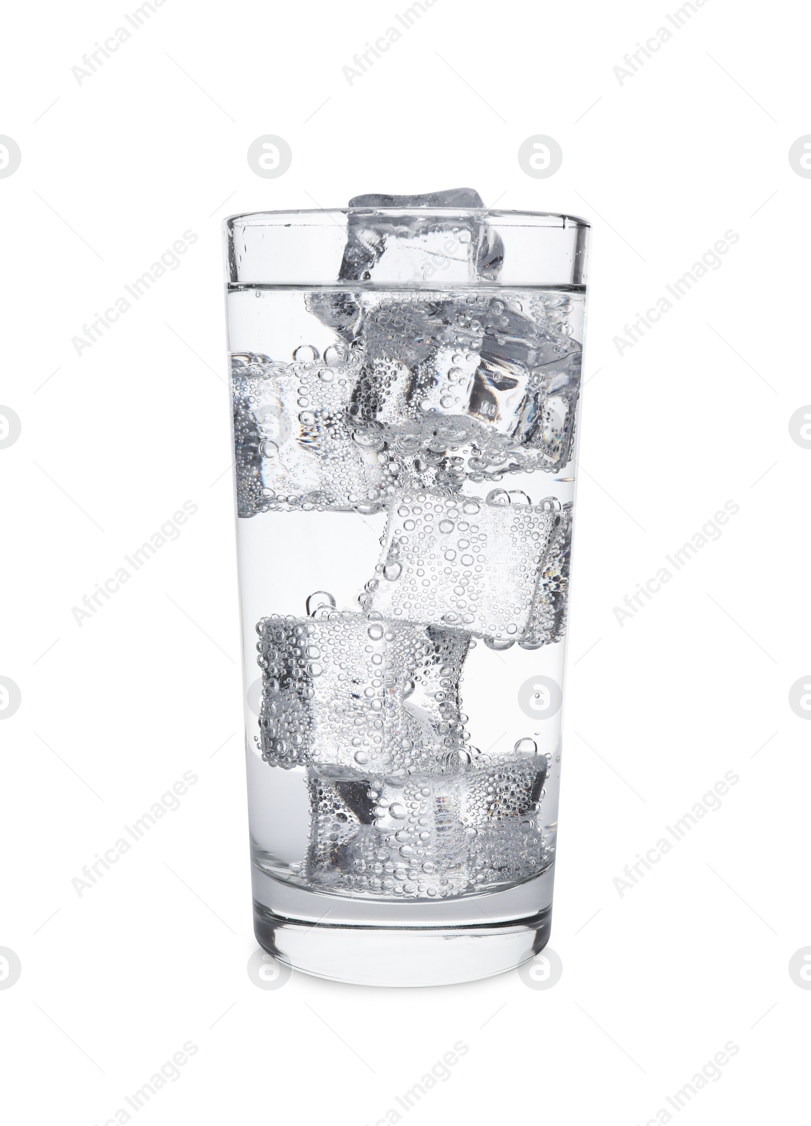 Photo of Glass of refreshing soda water with ice cubes isolated on white