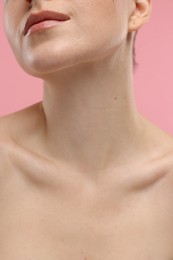 Photo of Beauty concept. Woman on pink background, closeup