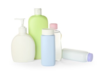 Bottles of baby cosmetic products on white background