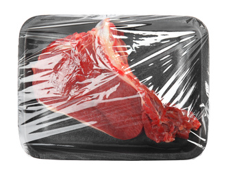 Photo of Fresh raw beef cut in plastic container isolated on white, top view