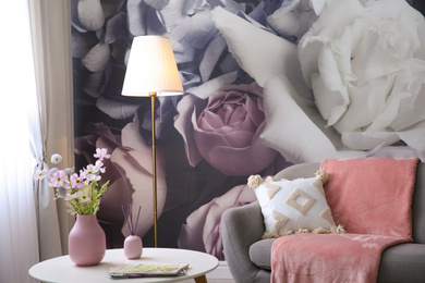 Photo of Beautiful floral photoart work used as wallpaper in living room interior