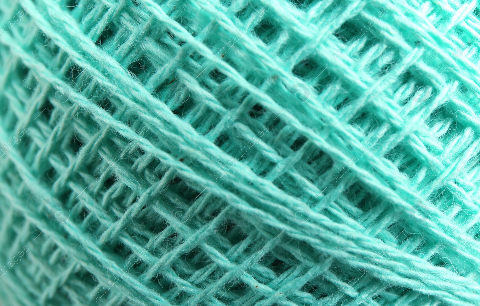 Photo of Clew of knitting threads as background, top view. Sewing stuff