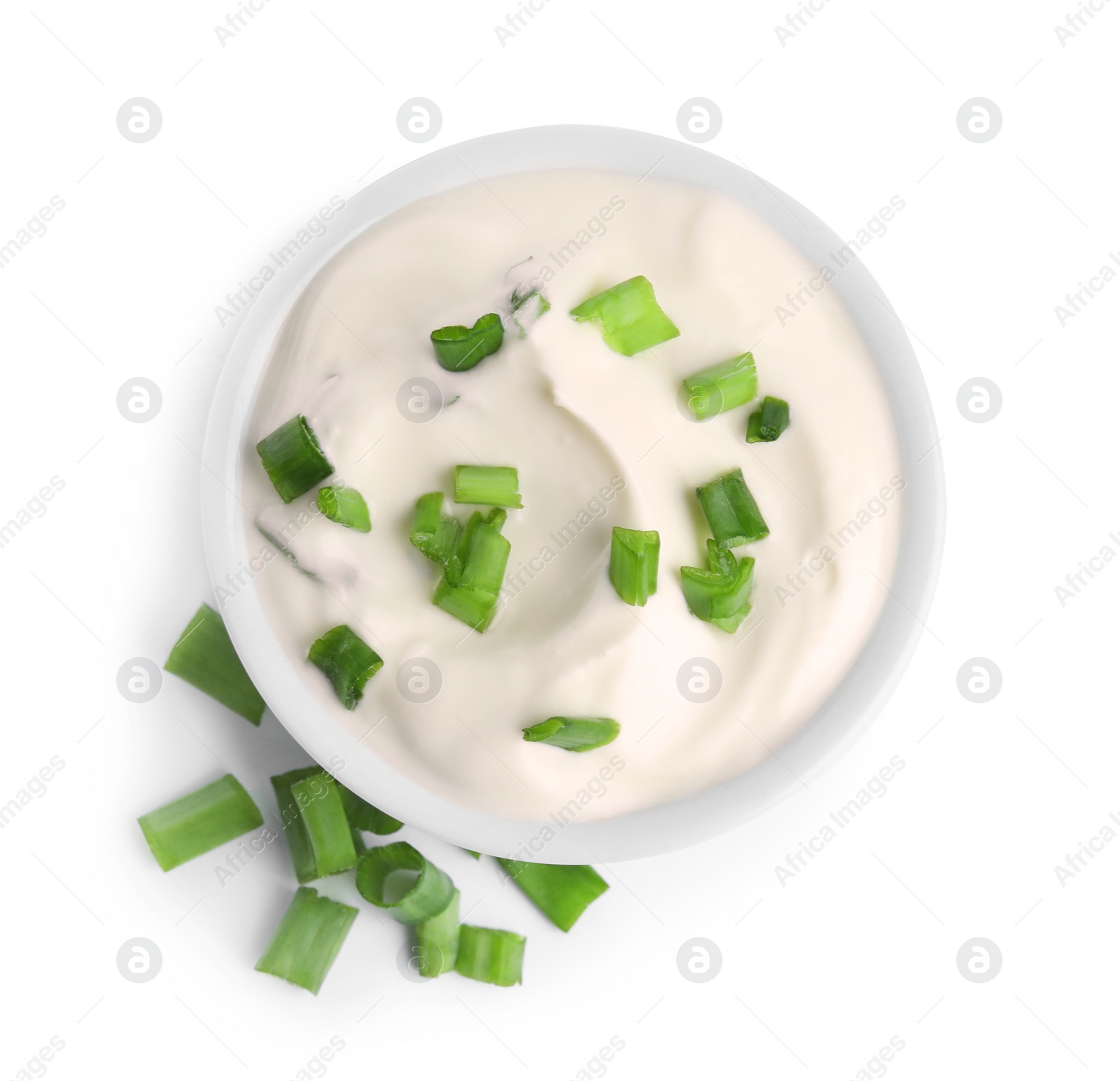 Photo of Fresh sour cream with onion on white background, top view